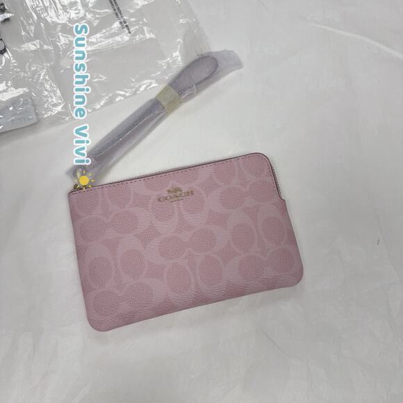 NWT Coach CAQ75 Corner Zip Wristlet In Signature Canvas In Gold/Powder Pink - Picture 1 of 7